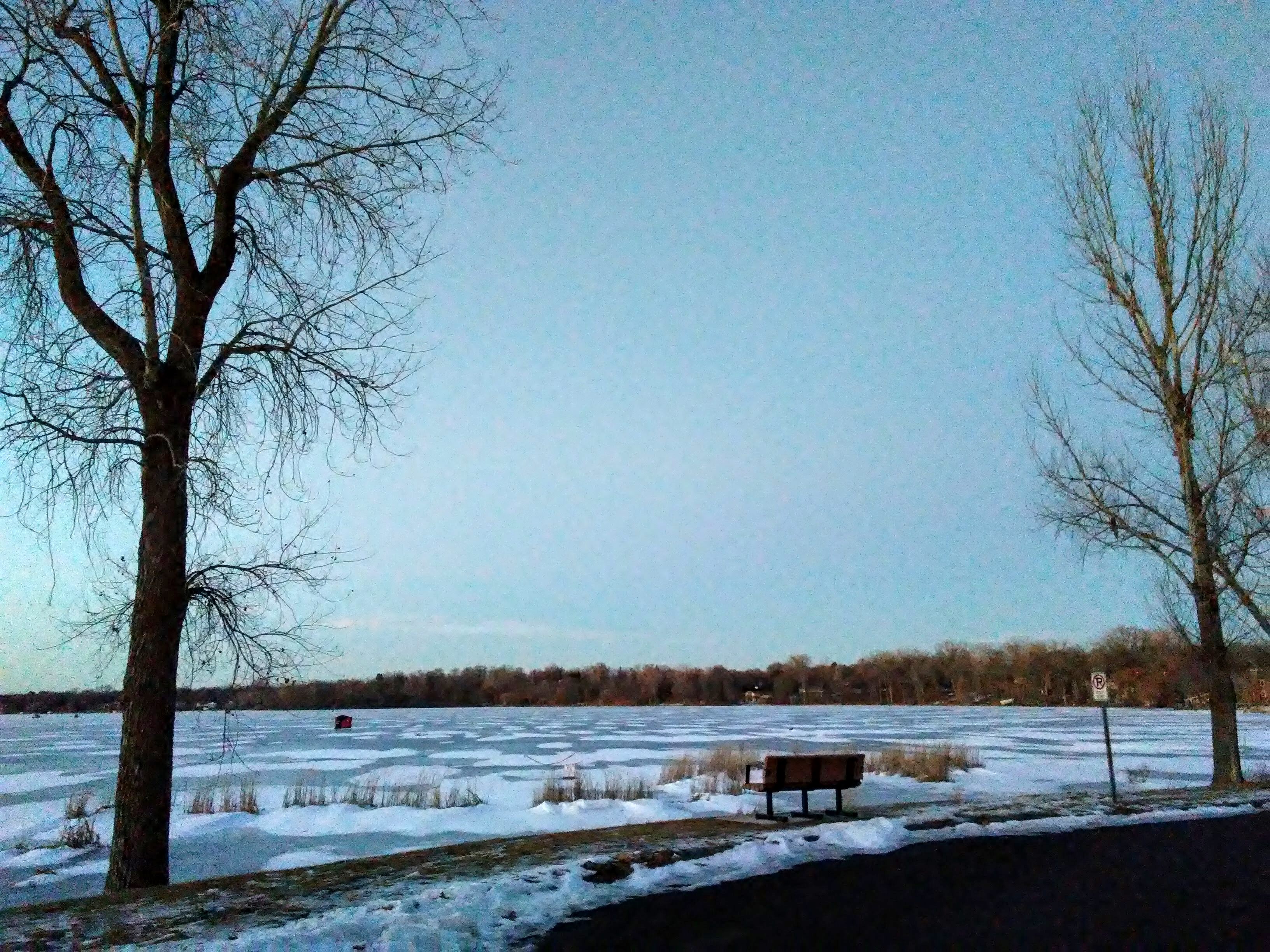 frozen lake, bench, fish house