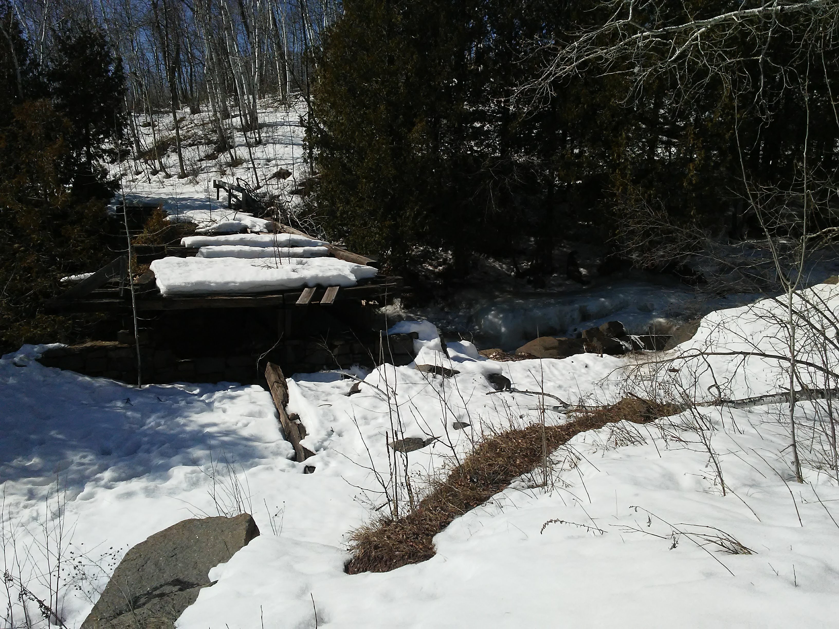 Snow covered bridge out.