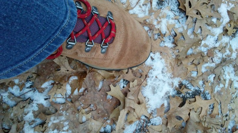hiking boot, blue jean hem, leaves, snow