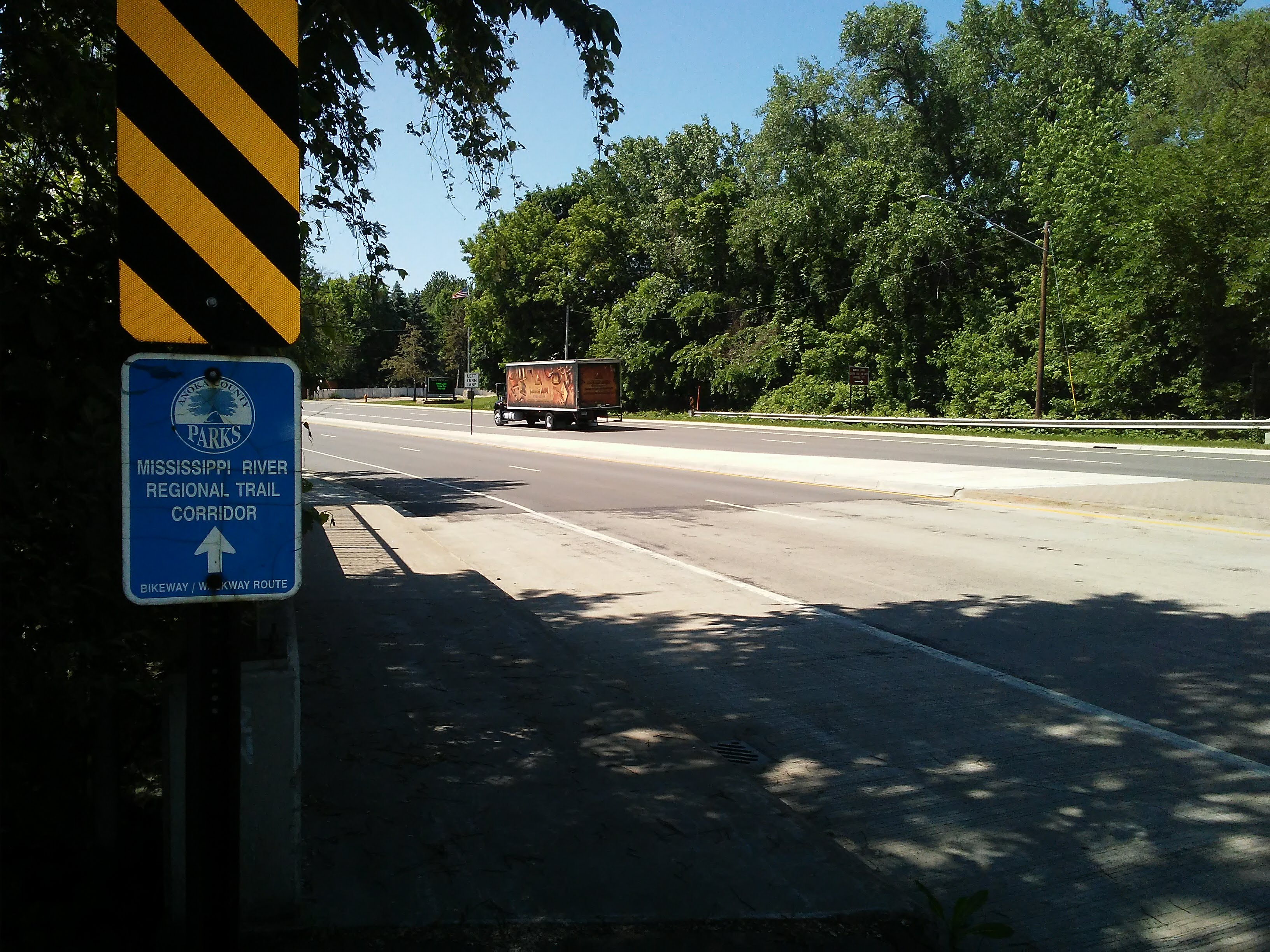 4 land street, a truck, a sign
