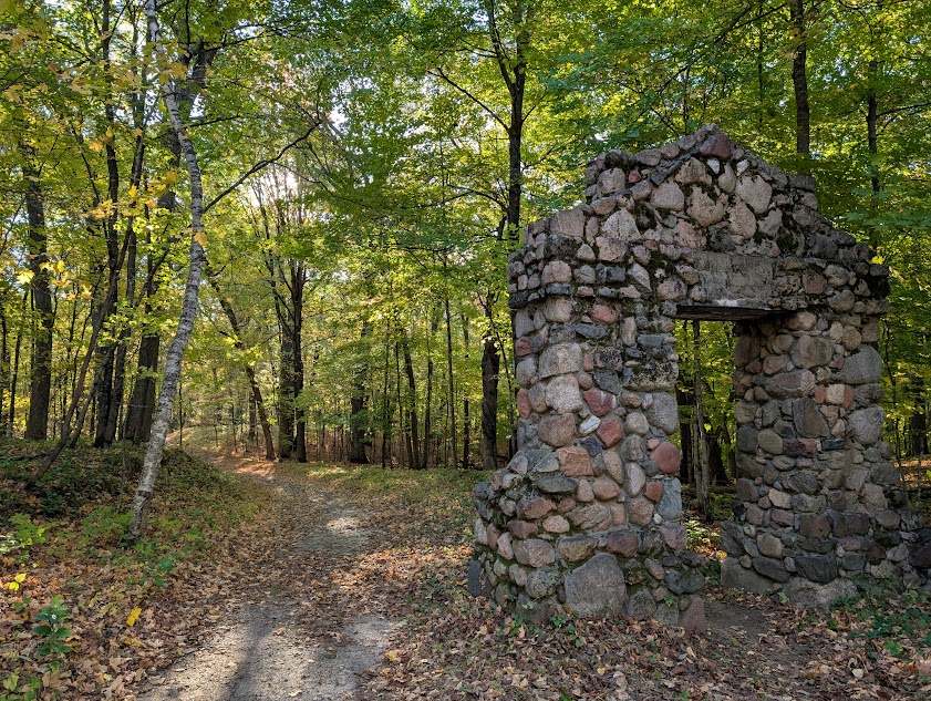 photo of stone arch in the woods